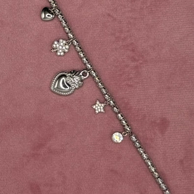 BRACCIALE CON CHARMS ACCIAIO