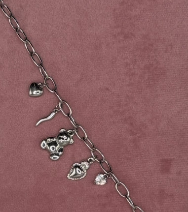 BRACCIALE CON ORSO E CHARMS ACCIAIO