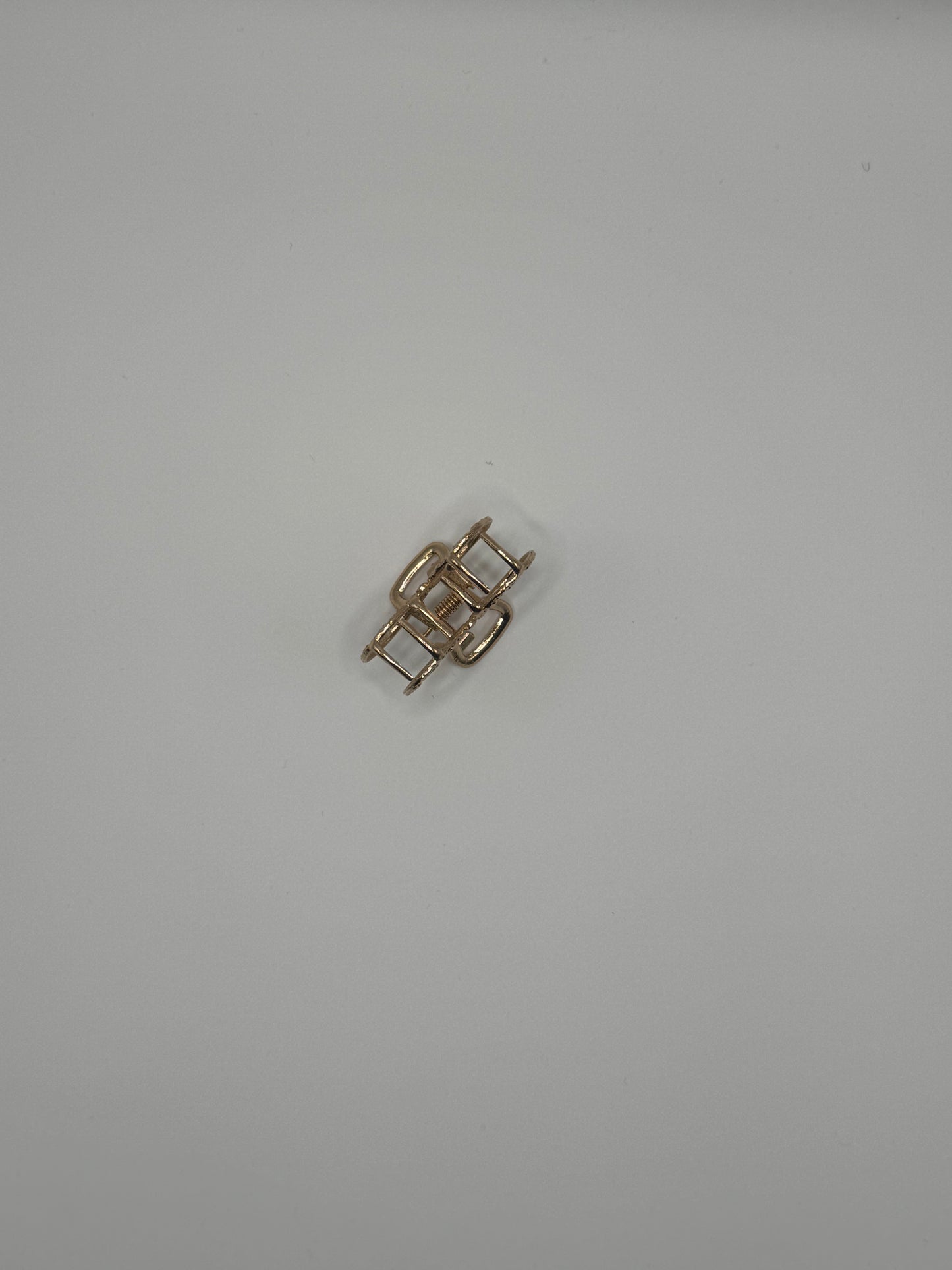 PINZA PICCOLA A FORMA DI FIOCCO ORO