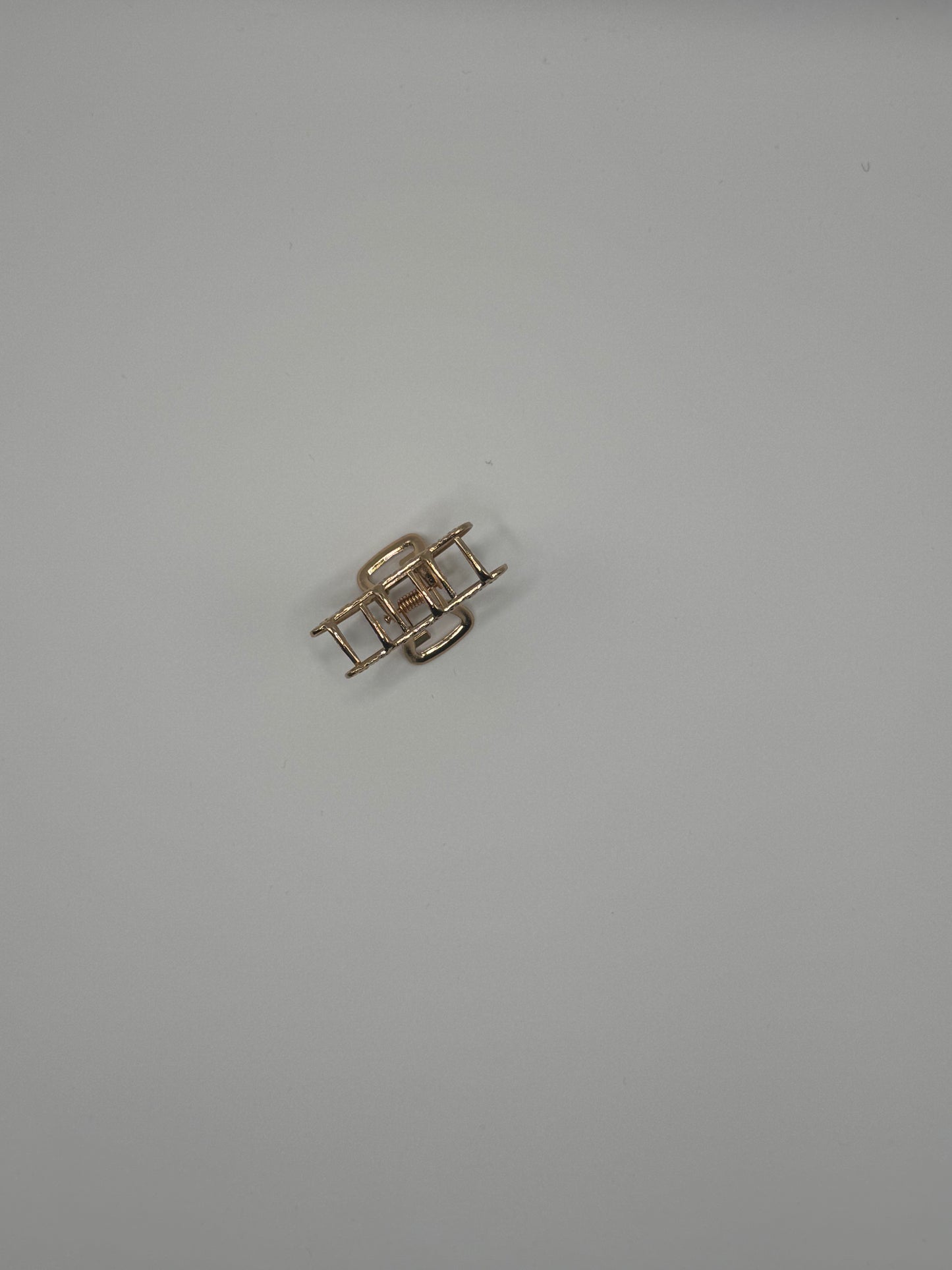 PINZA PICCOLA MEZZA LUNA ORO