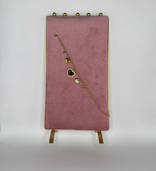 BRACCIALE CON CUORE MACULATO E CHARMS ORO