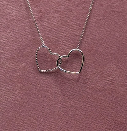 COLLANA CON CUORE INTRECCIATO GRANDE ACCIAIO