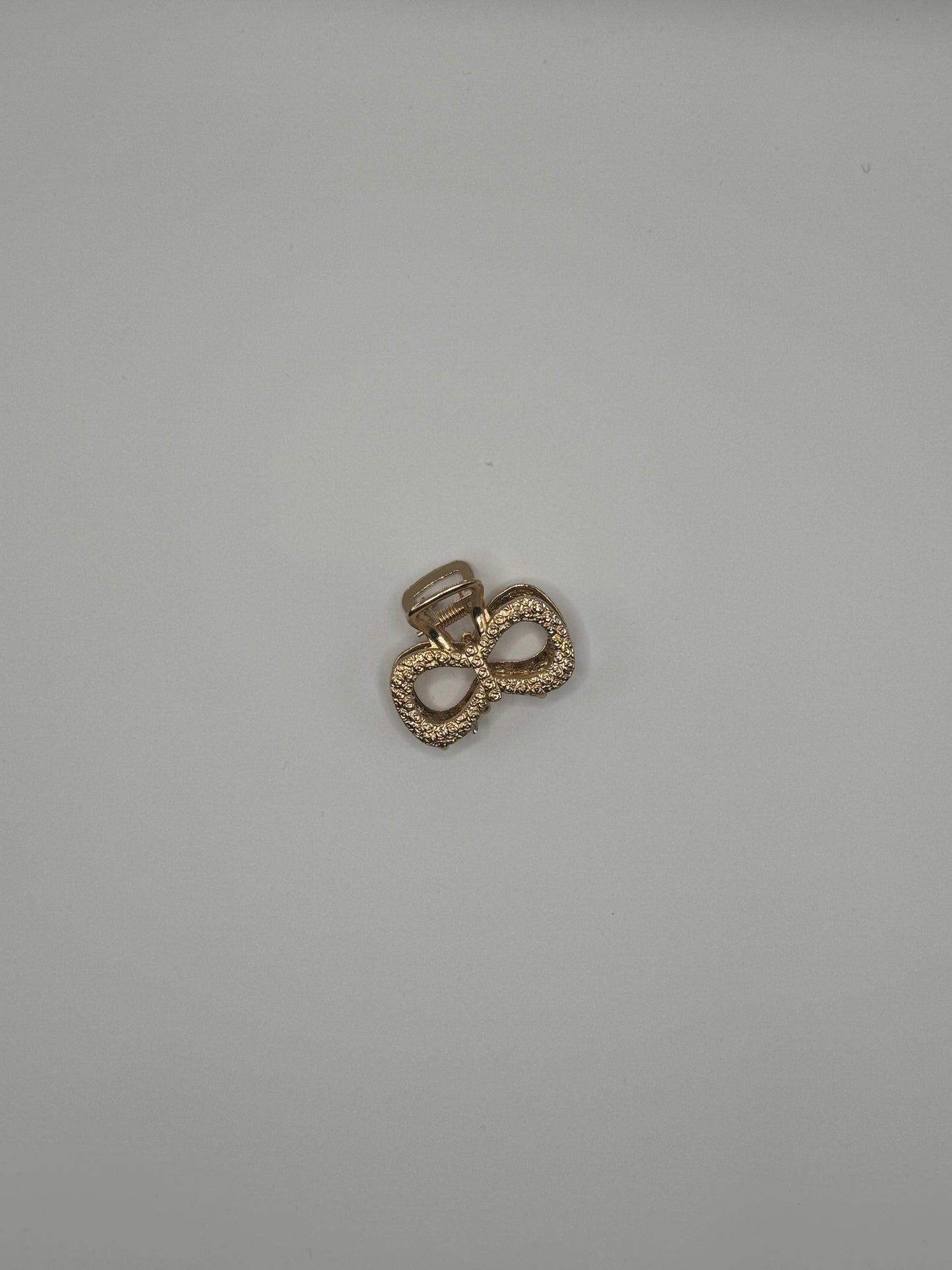 PINZA PICCOLA A FORMA DI FIOCCO ORO