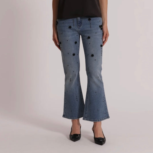 Mimì-Muà JEANS FLARE CON APPLICAZIONI FLOREALI